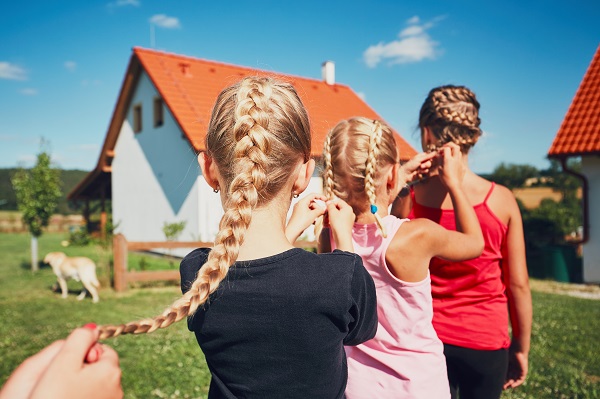 girls braiding hair